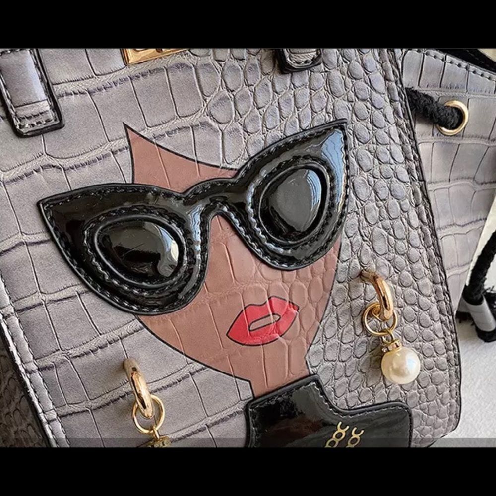 Lady In Grey Handbag - Picture 16 of 16